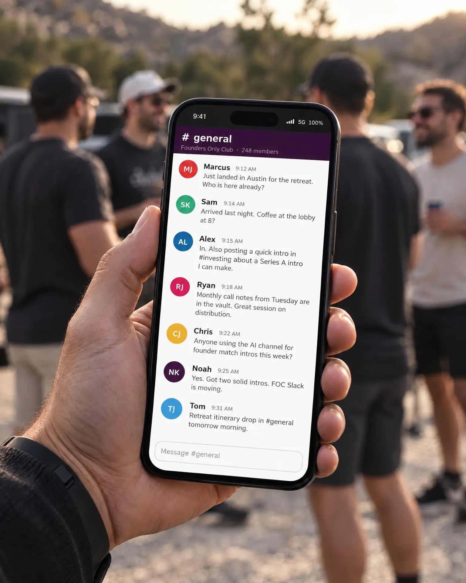 The Founders Only Slack on a phone at a retreat